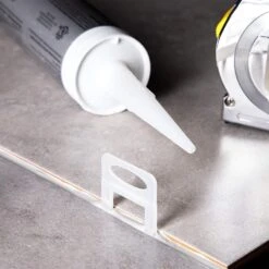 Juvale 400 Pack Tile Leveling Clips Reusable Plastic Leveling Spacer Clips (White, 1/32 Inch) -Flooring Store af54d660 04e9 4884 862e d13c69d091af.beecc63a5d0759f27fa3a38d714eb171 1800x1800