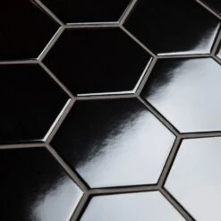Merola Tile Metro Hex 2 In. Glossy Black 11-1/8"x12-5/8" X 7 Mm Porcelain Mosaic Tile (9.64 Sq. Ft. / Case) 20 Merola Tile Metro Hex 2 In. Glossy Black 11-1/8"x12-5/8" X 7 Mm Porcelain Mosaic Tile (9.64 Sq. Ft. / Case) -Flooring Store cbfbc529b7b48eafa3e96a33f1505c79 1800x1800